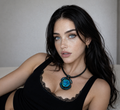 Woman wearing handmade aquamarine Murano glass necklace with black rubber cord