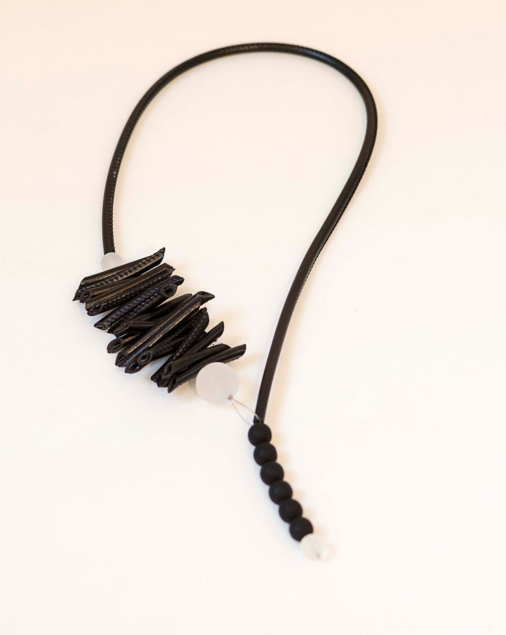 Necklace made of leatherette tube and glass pearls. Made entirely by hand by Cesare Sent in the Studio Glass of Murano.Refined jewel