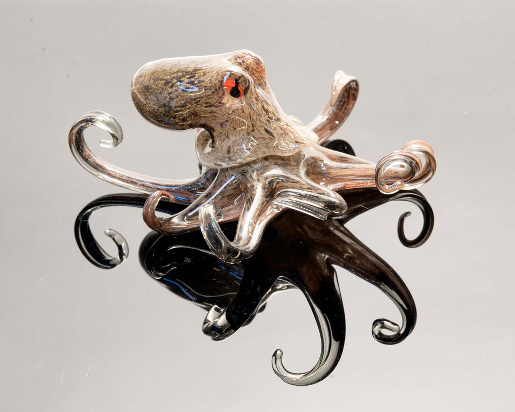 Octopus in Murano glass. Realistic realization in glass multicoloured.Sculpture of the glass master.