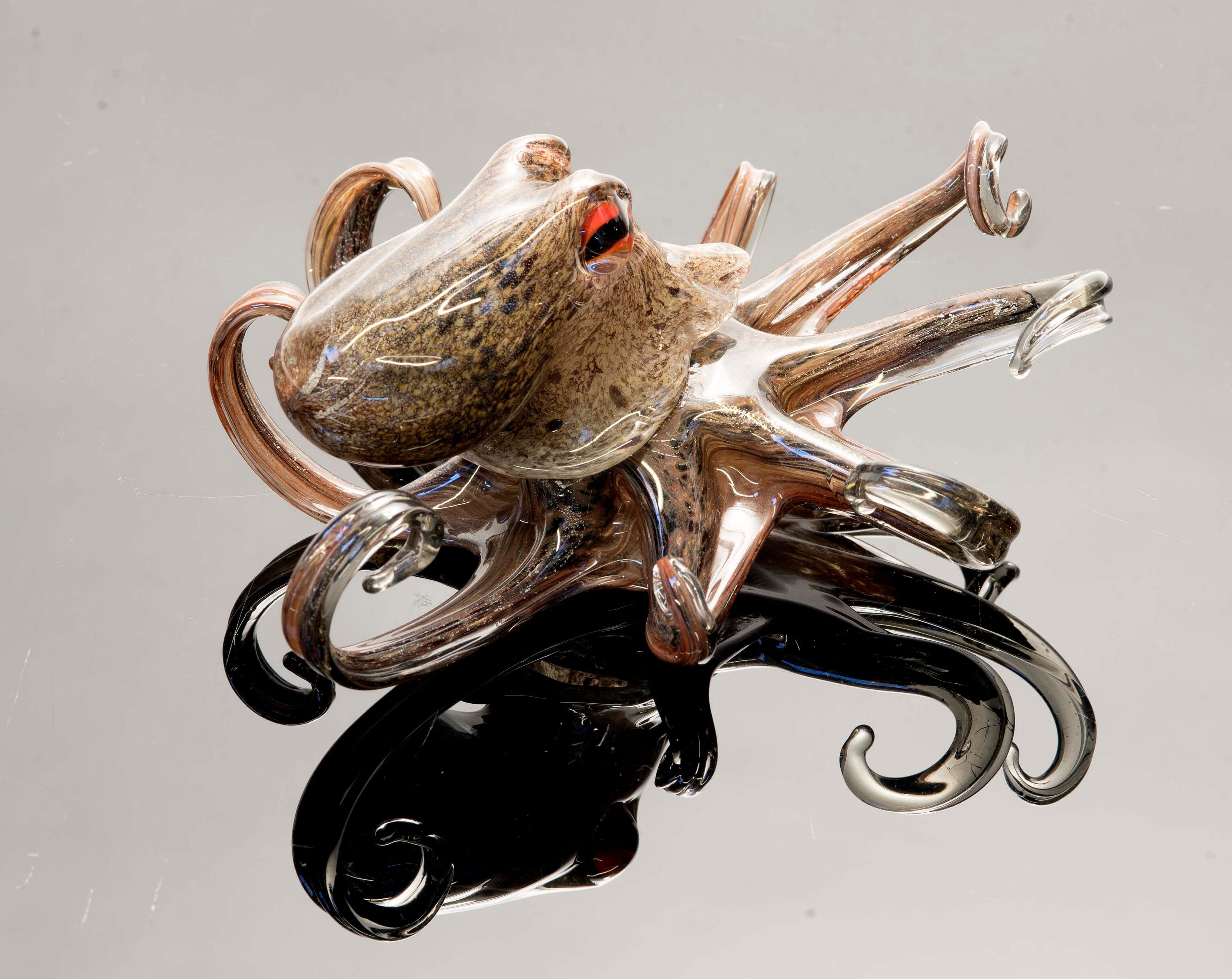 Octopus in Murano glass. Realistic realization in glass multicoloured.Sculpture of the glass master.