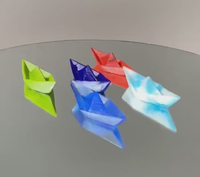 Paper boat in Murano glass. Realistic realization in glass.Sculpture of the glass master. Paper boat imitation. Paperweight glass made.